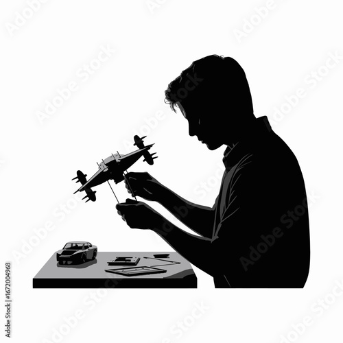 Model Building Enthusiast Working on Airplane Model