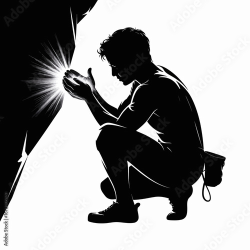 Silhouette of a Man Discovering Light in Darkness