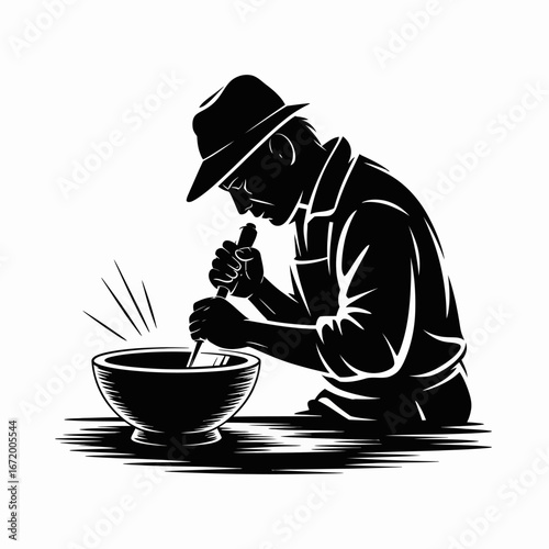 Silhouette of a Man Mixing in a Bowl