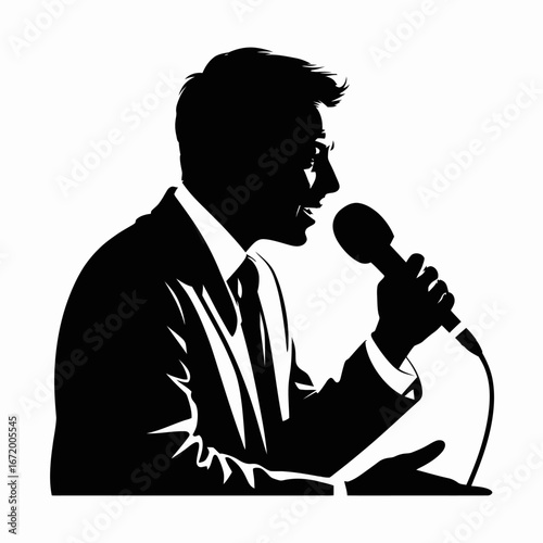 Silhouette of a Man Singing into a Microphone