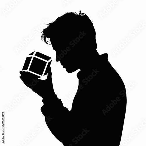 Silhouette of Person Holding a Cube, Contemplation