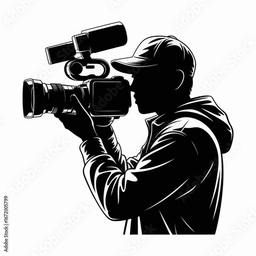 Silhouette of Videographer with Camera Equipment