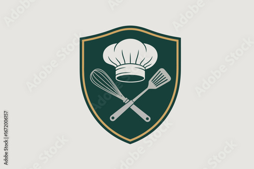 A culinary emblem featuring a chef's hat whisk and spatula on a shield with a green and gold border