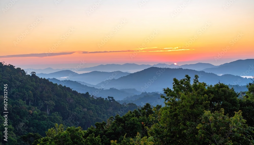 Obraz premium Panoramic Sunrise Vista Over Lush Green Mountain Range