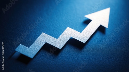 White arrow on a solid blue background representing direction and momentum in financial market trends and analysis