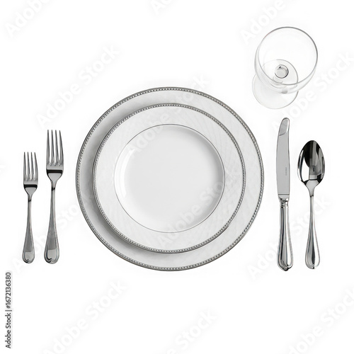 Elegant dinnerware set with plates, cutlery, and a wine glass, isolated on a transparent background for a clean and sophisticated presentation