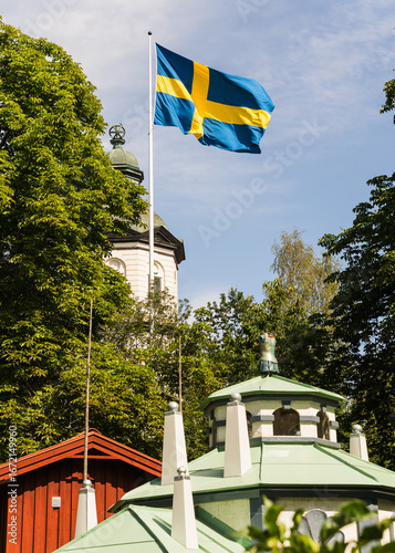 Wallpaper Mural detail of a playground and Swedish flag in Sweden Torontodigital.ca