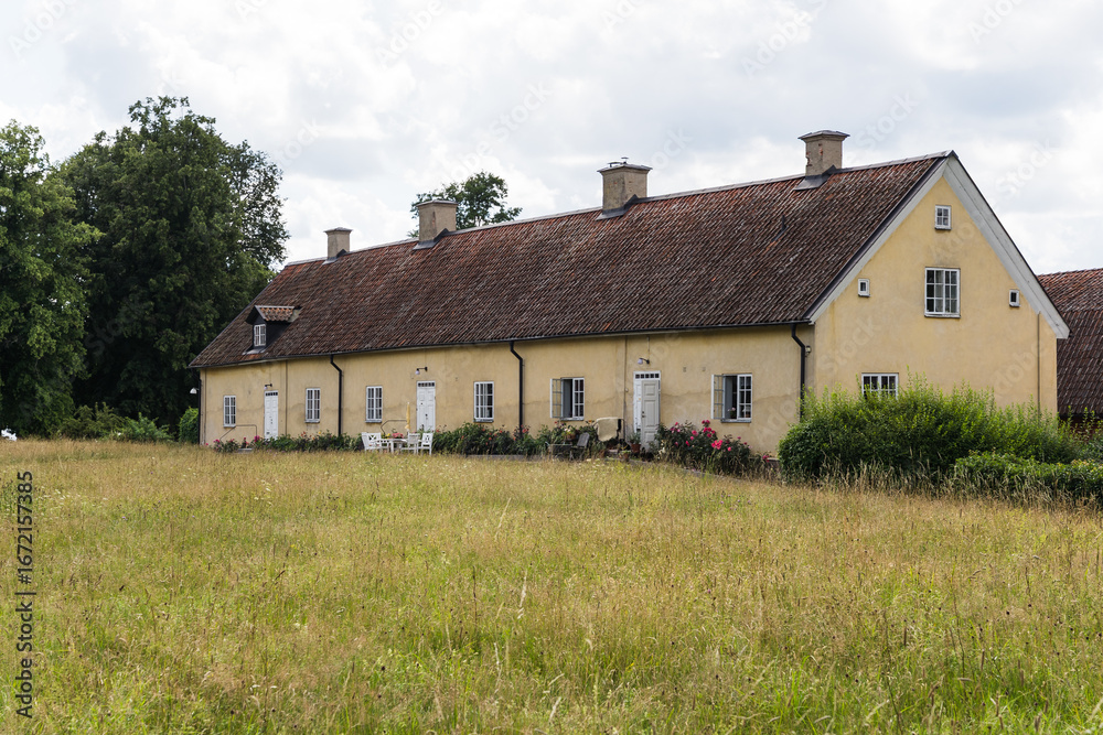 Obraz premium country road in a village in Sweden