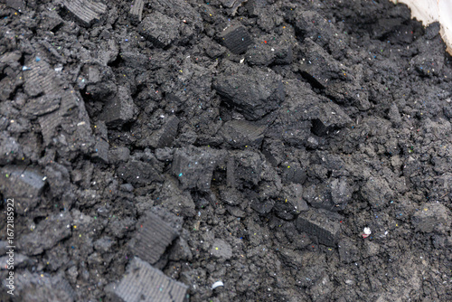 Industrial Wastewater Treatment: Dark Liquid Flowing into a Sludge Tank