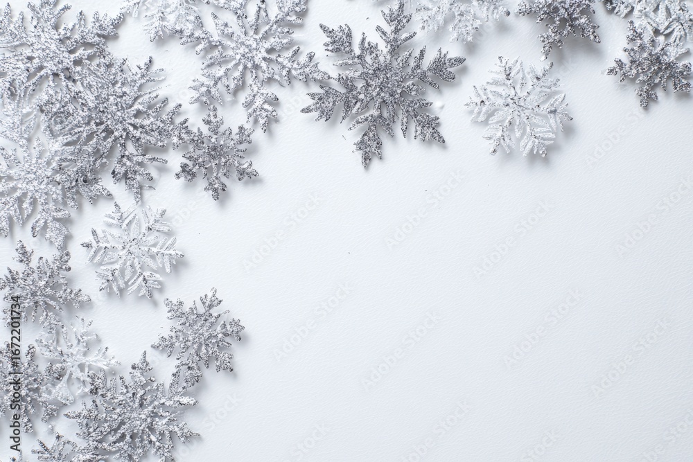 Obraz premium Silver snowflakes on white background