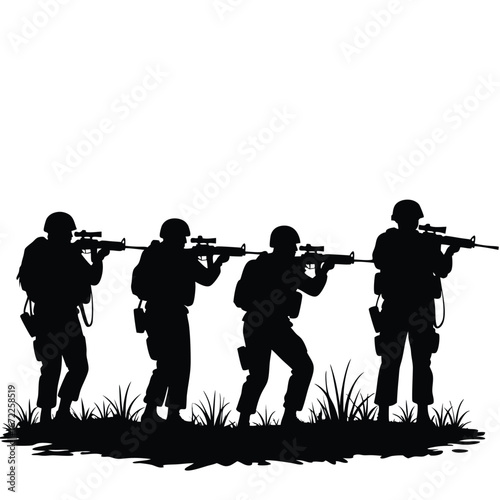 Four soldiers in silhouette aiming rifles in grassy field