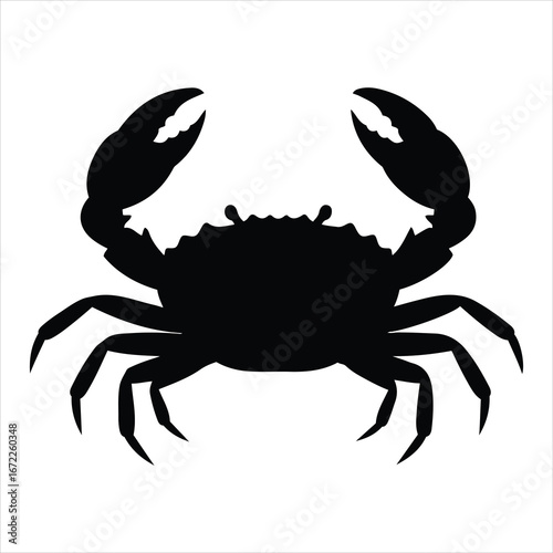 Silhouette of a crab with claws raised ready to defend isolated on a
