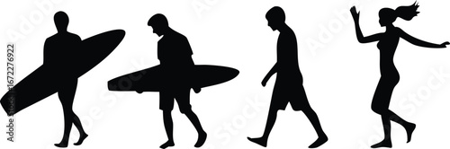 silhouettes of people at beach carrying surfboard