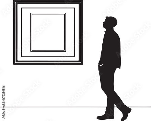 Silhouette of a man looking at a framed artwork on a white wall person male