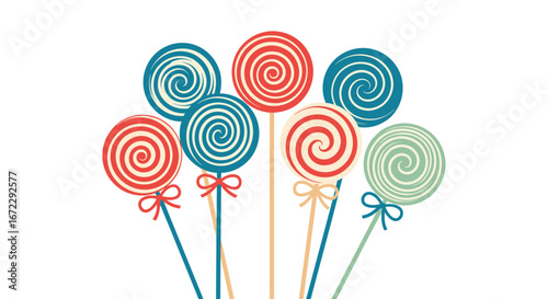 A beautiful array of swirl pattern lollipops tied with colorful ribbons on white background