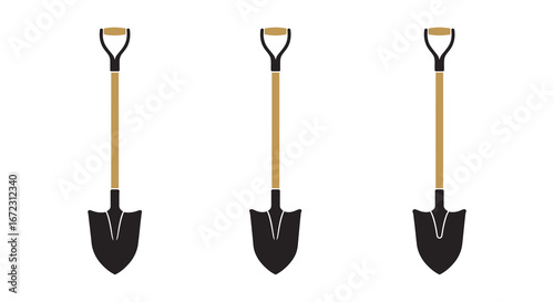 Three shovels with wooden handles and black blades standing upright in a row