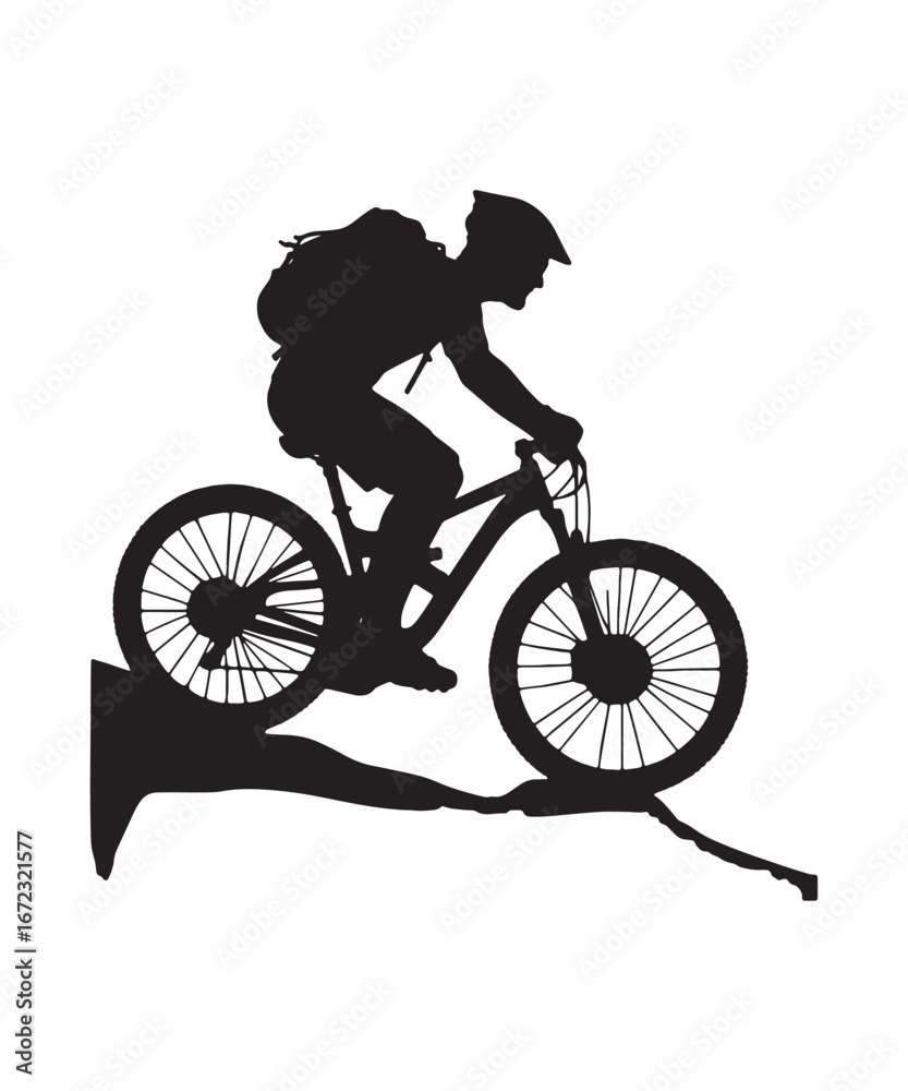 Fototapeta premium Silhouette of a Mountain Biker Riding Downhill on a Rocky Terrain Sticking Out with a Backpack and Helmet