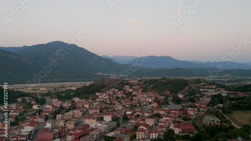 Aerial Drone Shot Over Kalabaka Town Near Meteora, Greek Macedonia, Northern Greece, At Sunset