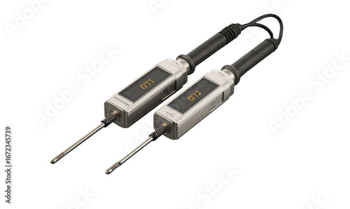 Two gray, rectangular devices with digital displays and probes, connected by a cable