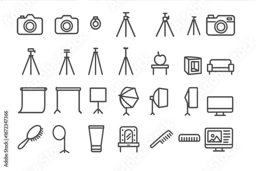 Camera equipment and photography accessories arranged in a structured layout for studio setup purposes