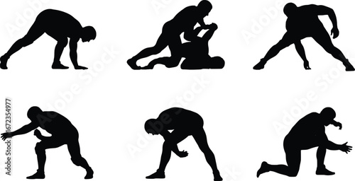 Diverse silhouettes of athletes performing wrestling moves and martial arts poses isolated on white