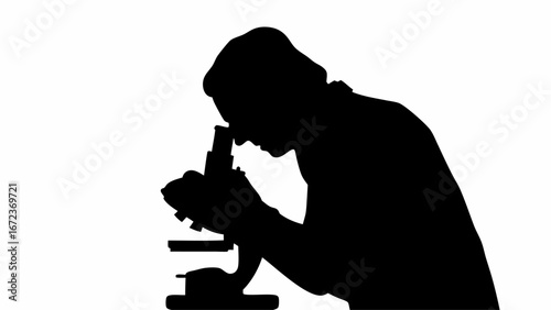 Silhouette of a person in lab coat using a microscope for scientific research and experimentation work