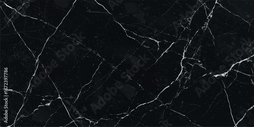Abstract black marble texture with white veins, a luxurious natural stone surface pattern for backgrounds and design