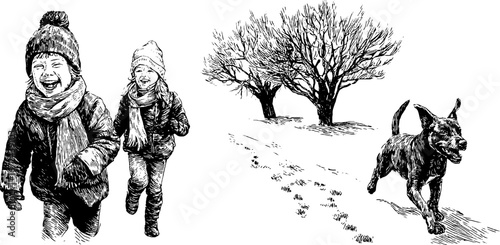Joyful winter scene of children chasing dog in snow