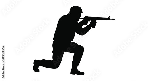 soldier in kneeling position aiming rifle in silhouette