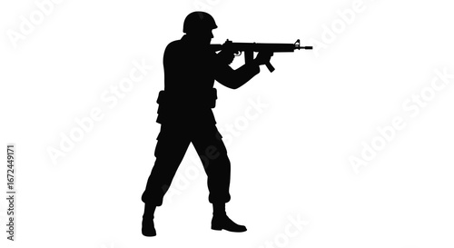 soldier in silhouette holding a rifle and aiming