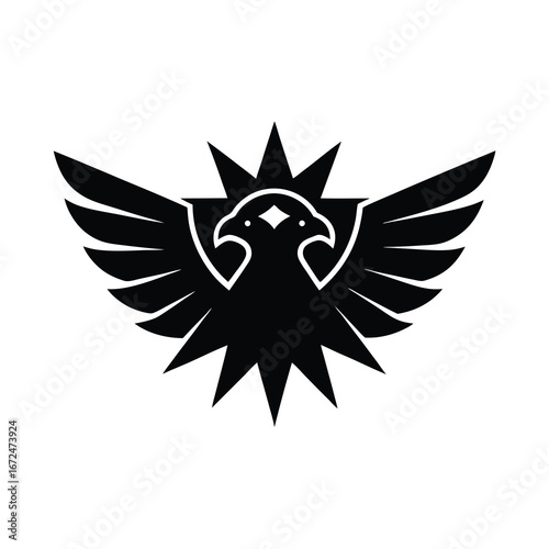 silhouette of a falcon face with spread wings