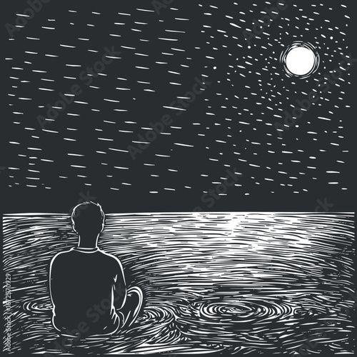 Silhouette of a man sitting by the ocean shore at night with the moon reflecting on calm water