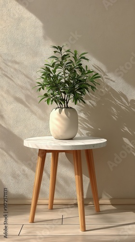 Stylish Indoor Plant Arrangement on a Wooden Table With a Ceramic Cup and a M...