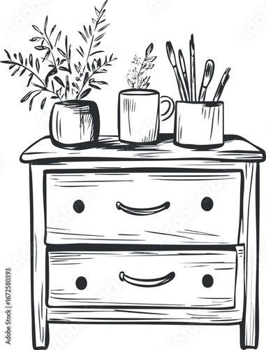 Black and white sketch of a wooden two-drawer table with plants and brush containers on top
