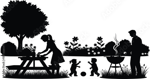 Silhouette of a family enjoying a barbecue picnic with children playing grill