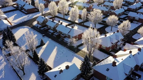 Aerial View of Residential House After Snow Storm Under Sunlight