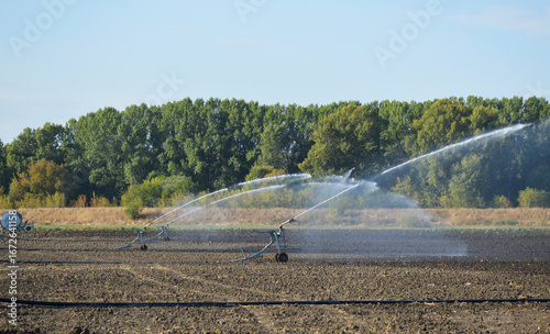 self-propelled irrigation system for industrial irrigation of agricultural fields. irrigation and fertilization of fields with growing crops. irrigation and melioration