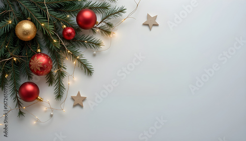 Wallpaper Mural Festive Christmas Decorations with Fir Branches and Lights.A flat lay showcasing Christmas decorations, including red and gold baubles, fir branches, fairy lights, and wooden stars, arranged in a corn Torontodigital.ca