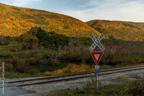 A railroad crossing in the Fall