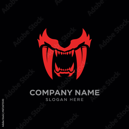 A stylized red logo of a fierce monster's head with large fangs and an open mouth on a black background.