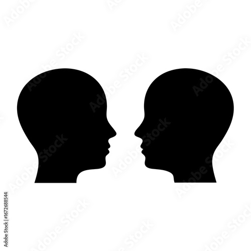 Two Silhouetted Heads in Profile Facing Each Other in Stark Contrast