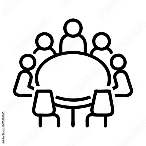 A group of people gathered for a meeting around a round table