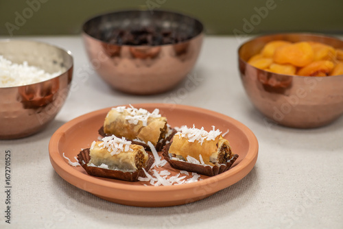 A plate with baklavas and other arabic ingredients