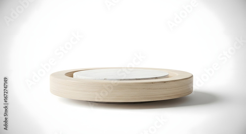 Round wooden podium with another round stone in the center