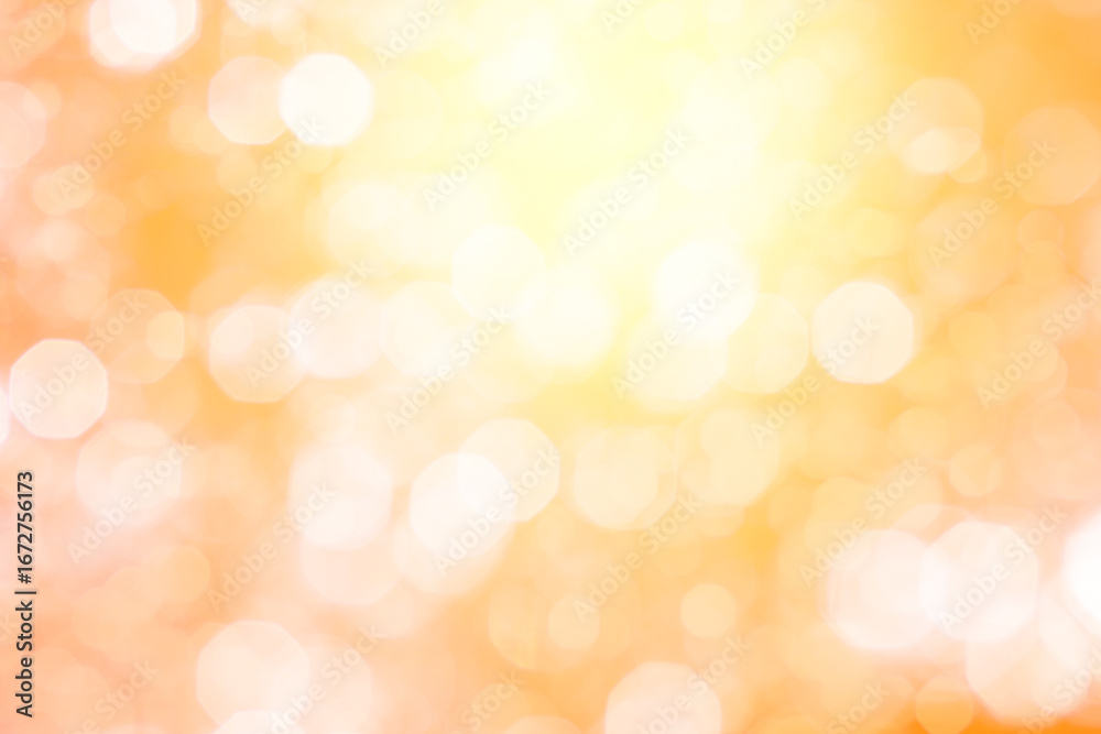 Obraz premium ボケた暖色の背景に光