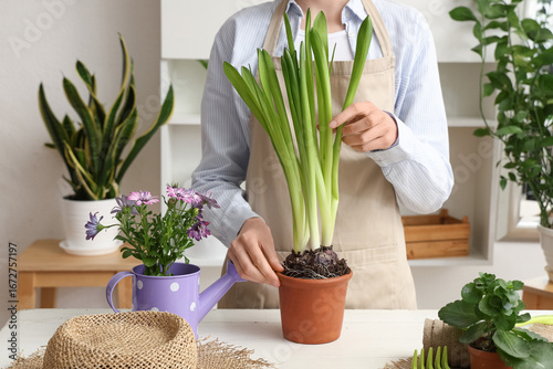 Female gardener with differ...