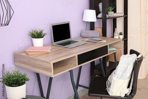 Modern school desk with sta...