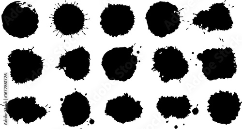 Vibrant green watercolor paint splatters and abstract inkblots isolated on clean white, ideal for creative design backgrounds.