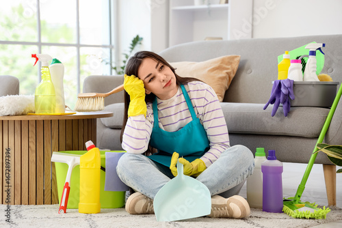 Female janitor with cleanin...