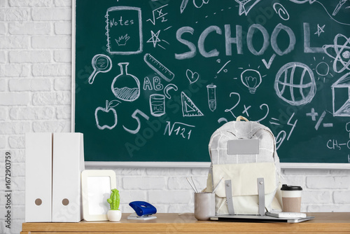 Backpack with coffee cup an...